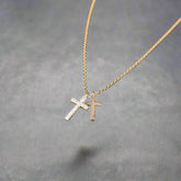 gold double cross in gold
